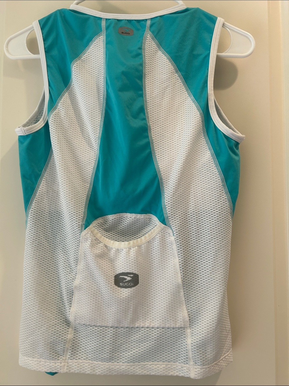 Sugoi Women’s 1/4 zip Sleeveless Athletic Biking Athletic Top size L Teal White